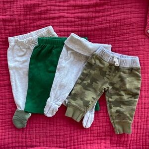 Lot of four baby boys pants. Sizes 0-3 months to 3 months. Various brands